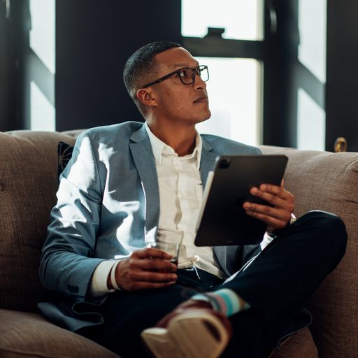 Side model view of Sonoma men's fashionable brown demi professional blue light blocking frames and glasses.