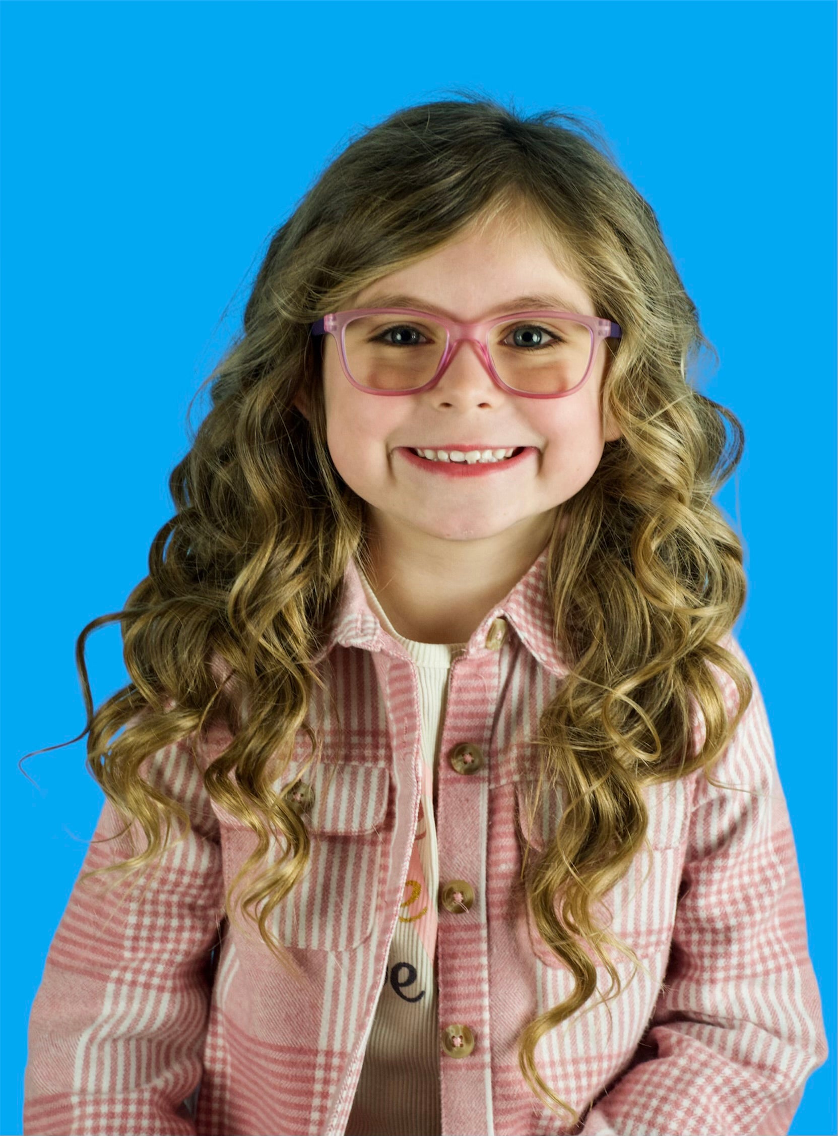 Model view of Sydney kids pink cute protective blue light blocking girl's glasses and frames.