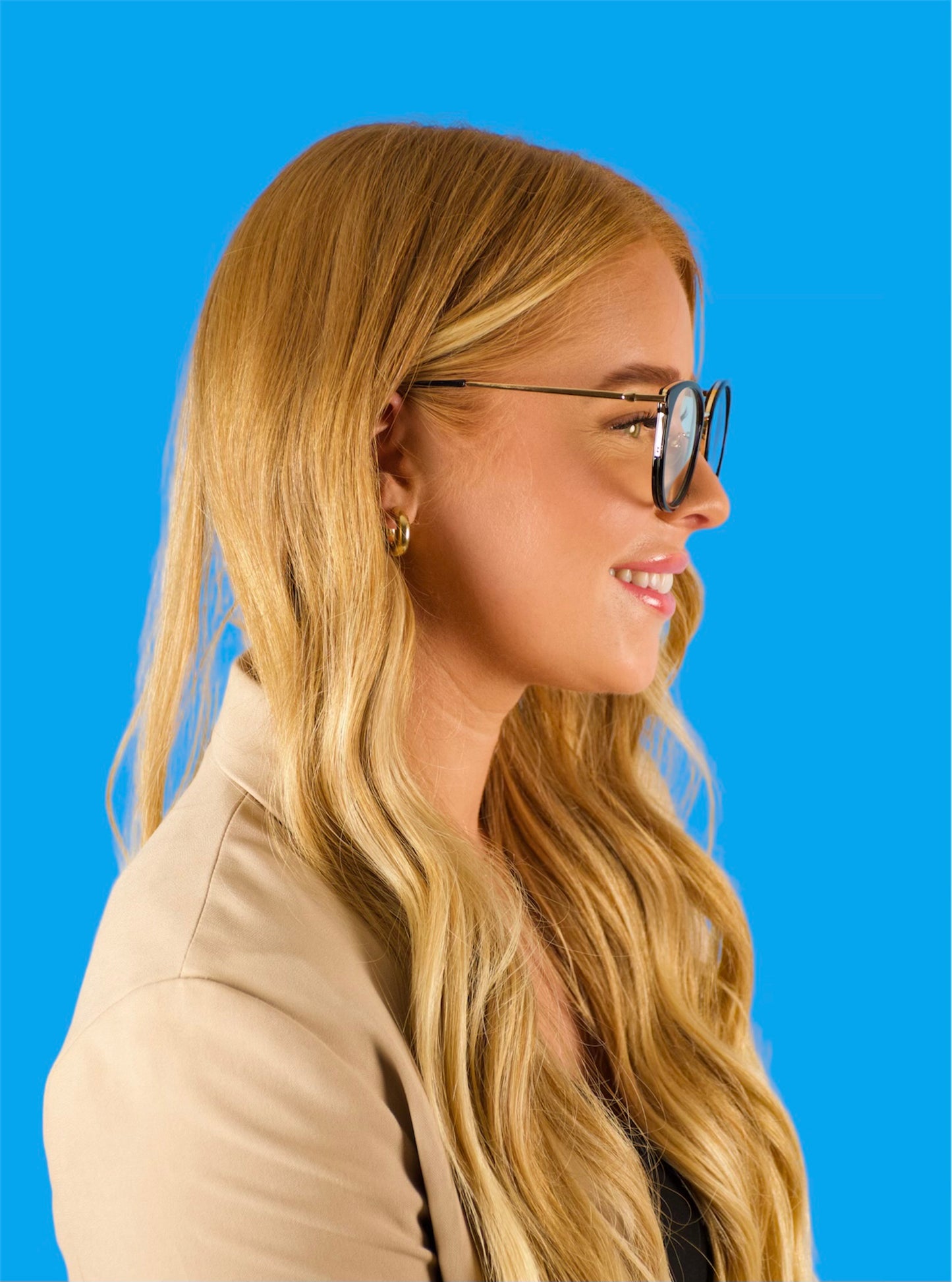 Side model of Bold, powerful, beautiful, fashionable women's blue light blocking protective Madison frames and glasses.